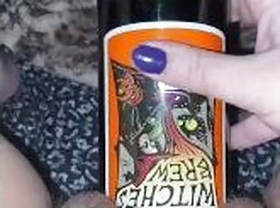 Horny Milf fucks wine bottle
