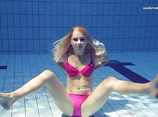 Solo model blonde teen widening legs in the pool seductively
