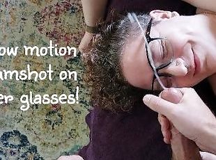 Slow motion cumshot on her glasses!