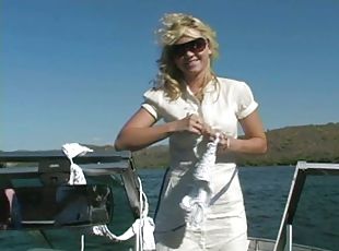Alison Angel kneads her big natural tits on a yacht