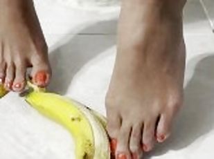Cute tiny feet stroke, peel and crush a banana - MandySnow free clip