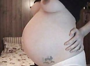 Amateur Preggo Shows Her Glowing boobs and Her Swollen Tummy On Webcam