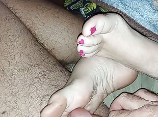 I love stoking my cock on her soft feet