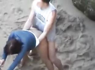 Couple filmed messing around on the beach