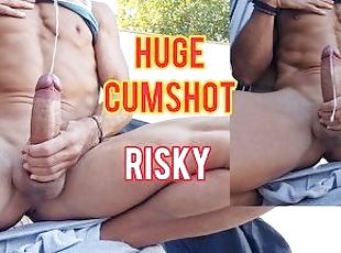 Huge cumshot - Hot Guy cums in a risky place