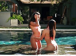 Jenna sativa and Maya Grand have a lesbian experience in the pool
