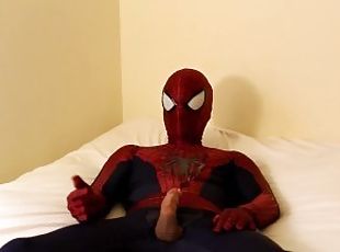 spiderman jerks off and cums all over his suit