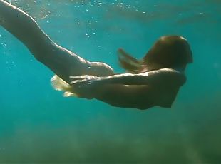Hot Babe Swims In The Sea Like A Mermaid