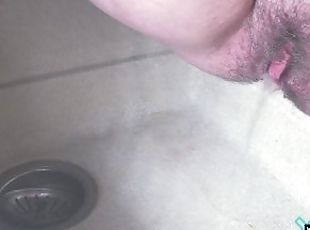 Pissing in the sink in the kitchen