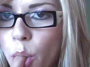 Webcam beauty in glasses masturbates her vagina