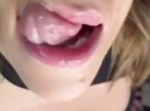 Your giantess Ashley shows you the inside of her mouth and makes sounds like she's giving you a blow