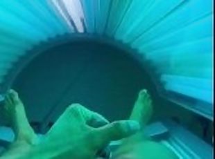 Stroking in tanning bed