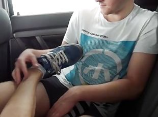 Colleague from highschool gave me footjob in a car