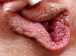 young pink shaved pussy of blonde babe toyed close up