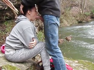 Deep blowjob by the river