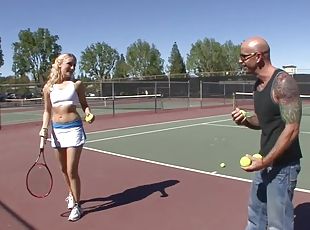 Adorable blonde teen was picked up while she was practicing her tennis skills.