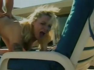 Outdoor retro porn with a sexy blonde and her big tits