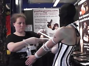 Slave Bound With Rope At Public Event