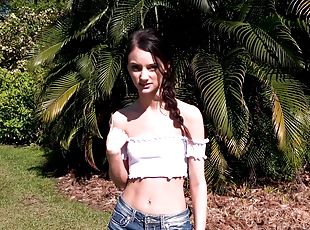 Slim brunette girl Paisley Pepper has fun with a dick outdoors