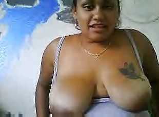 Huge tit black girl on webcam masturbating