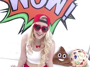 Samantha rone posing in tight tank top, red shorts and backwards cap