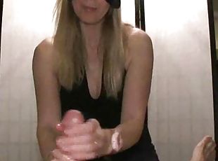 Girl in a mask gives a great handjob