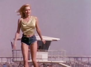 Vintage blonde Karen Foster poses for the cam in her denim shorts