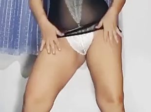 Mirella Delicia is a naughty bitch in a black sheer nightgown and white lingerie doing a striptease