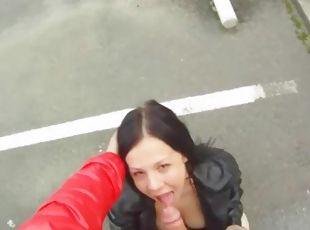 Blowjob in a parking lot from a cute chick