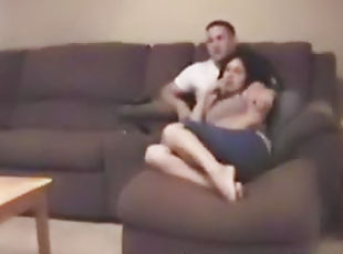 Voyeur view of couple couch fucking