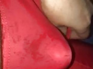 Cock stroking through thin red underwear shows really hot shapes