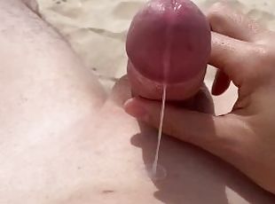 Jerking off alone on a public nude beach