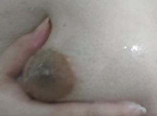 Chubby trans girl playing with her tits and a dildo on the shower