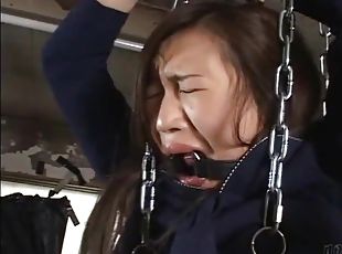Chained up Japanese schoolgirl toy fucked