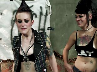 Tattooed lesbian punk bitches using strapons on each other